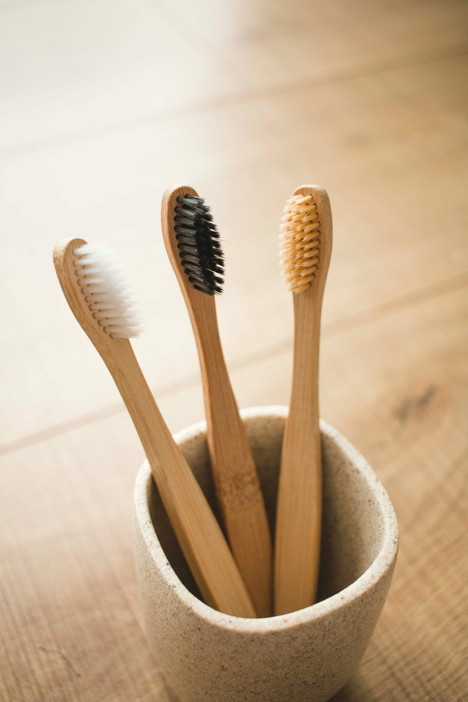 brown wooden sticks in gray ceramic bowl